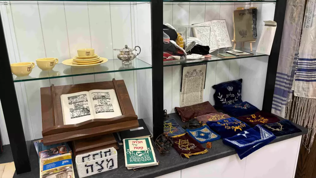 Exhibit showcasing various items at the Congregation B’nai Israel Museum.